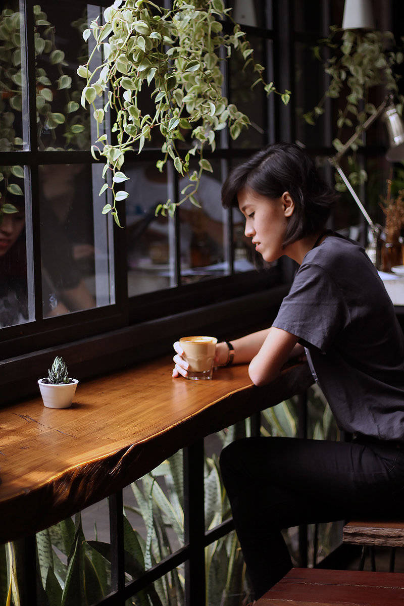 woman drinking coffee